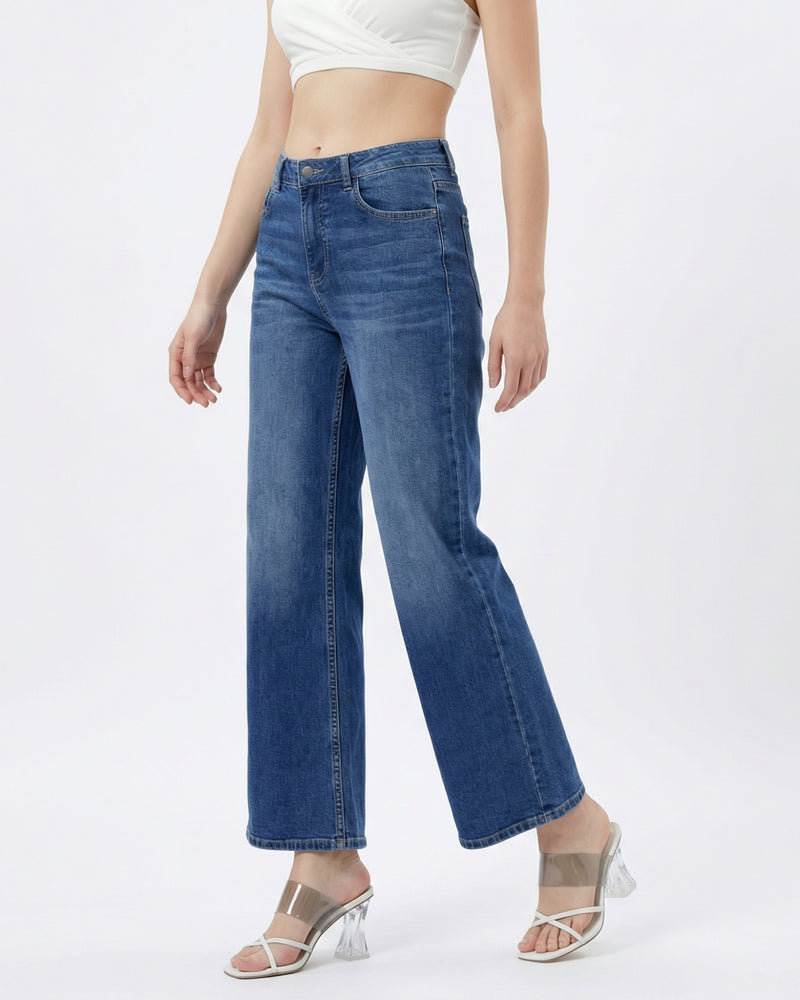 woman wearing high-rise wide-leg blue jeans
