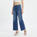 woman wearing high-rise wide-leg blue jeans
