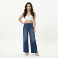 woman wearing high-rise wide-leg blue jeans