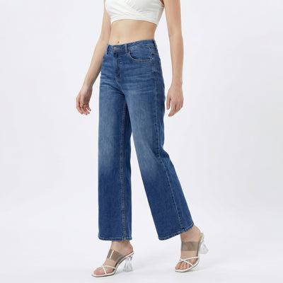 woman wearing high-rise wide-leg blue jeans